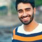 Portrait of a beautifull smiling man indian ethnicity looking at the camera. Portrait of a beautifull smiling man indian ethnicity looking at the camera.